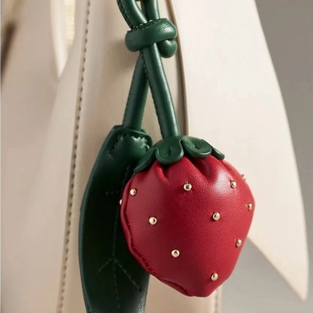 Melie Bianco Cream Mini Bag with Red Strawberry Charm